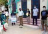 राष्ट्रीय सेवा योजना के तहत ग्रामीणों को सैनिटाइजर व मास्क वितरित किए rashtriya seva yojana