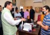 सीएम धामी ने आरटीओ ऑफिस में मारा छापा, आरटीओ को किया सस्पेंड RTO Dinesh Pathoi suspended