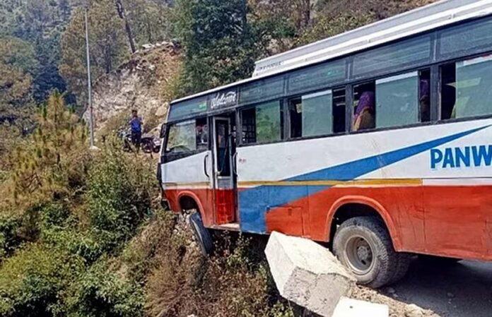 Bus hangs in the air after breaking the parapet in Rudraprayag