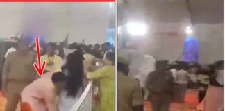 ग्रेटर नोएडा में बाबा बागेश्वर धाम के कार्यक्रम में सेवादार ने महिला को उठा कर रेलिंग के पार फेंका, FIR दर्ज, पास खड़ा दरोगा सस्पेंड